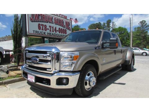Pale Adobe Metallic Ford F350 Super Duty XLT Crew Cab Dually.  Click to enlarge.