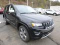 Front 3/4 View of 2014 Jeep Grand Cherokee Overland 4x4 #7
