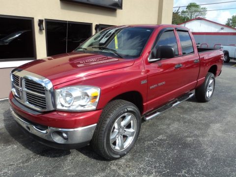 Inferno Red Crystal Pearl Dodge Ram 1500 SLT Quad Cab 4x4.  Click to enlarge.