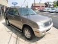 Front 3/4 View of 2004 Mercury Mountaineer V8 AWD #3