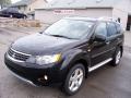 2009 Outlander XLS 4WD #1