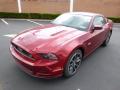 Front 3/4 View of 2014 Ford Mustang GT Premium Coupe #4