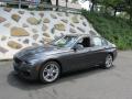 Front 3/4 View of 2014 BMW 3 Series 335i xDrive Sedan #1