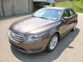 Front 3/4 View of 2015 Ford Taurus SEL #4