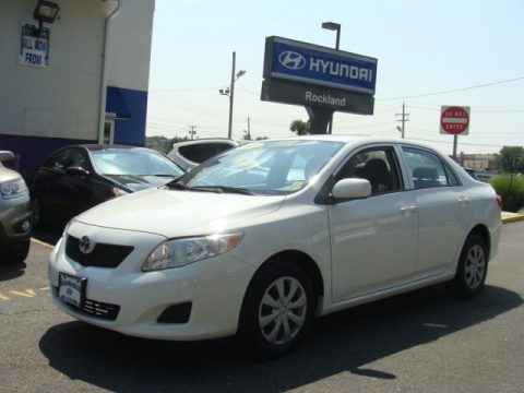 Super White Toyota Corolla LE.  Click to enlarge.