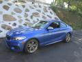 Front 3/4 View of 2015 BMW 2 Series M235i xDrive Coupe #1