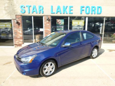 Vista Blue Metallic Ford Focus SE Coupe.  Click to enlarge.