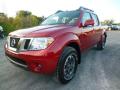Front 3/4 View of 2014 Nissan Frontier Pro-4X Crew Cab 4x4 #3