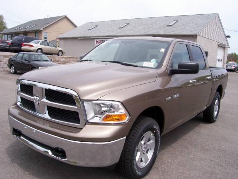 Austin Tan Pearl Dodge Ram 1500 SLT Crew Cab 4x4.  Click to enlarge.