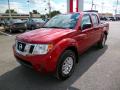 Front 3/4 View of 2015 Nissan Frontier SV Crew Cab 4x4 #3