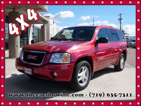 Magnetic Red Metallic GMC Envoy SLE 4x4. Click to enlarge. Magnetic Red Metallic GMC Envoy SLE 4x4. Click to enlarge.