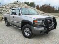 Front 3/4 View of 2006 GMC Sierra 2500HD SLE Extended Cab 4x4 #1