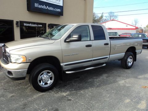 Light Almond Pearl Metallic Dodge Ram 2500 SLT Quad Cab 4x4.  Click to enlarge.
