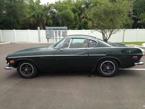 Dark Green Volvo 1800 E.  Click to enlarge.