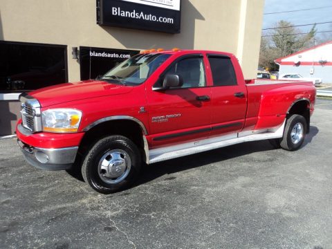 Flame Red Dodge Ram 3500 SLT Quad Cab 4x4 Dually.  Click to enlarge.