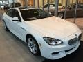 Front 3/4 View of 2015 BMW 6 Series 650i xDrive Gran Coupe #1