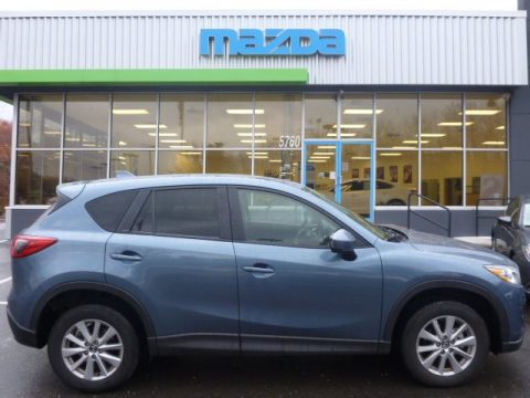 Blue Reflex mica Mazda CX-5 Touring AWD. Click to enlarge. Blue Reflex mica Mazda CX-5 Touring AWD. Click to enlarge.