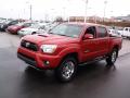 Front 3/4 View of 2012 Toyota Tacoma V6 TRD Sport Double Cab 4x4 #7